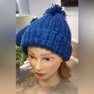 Hat knitted with blue cotton thread.